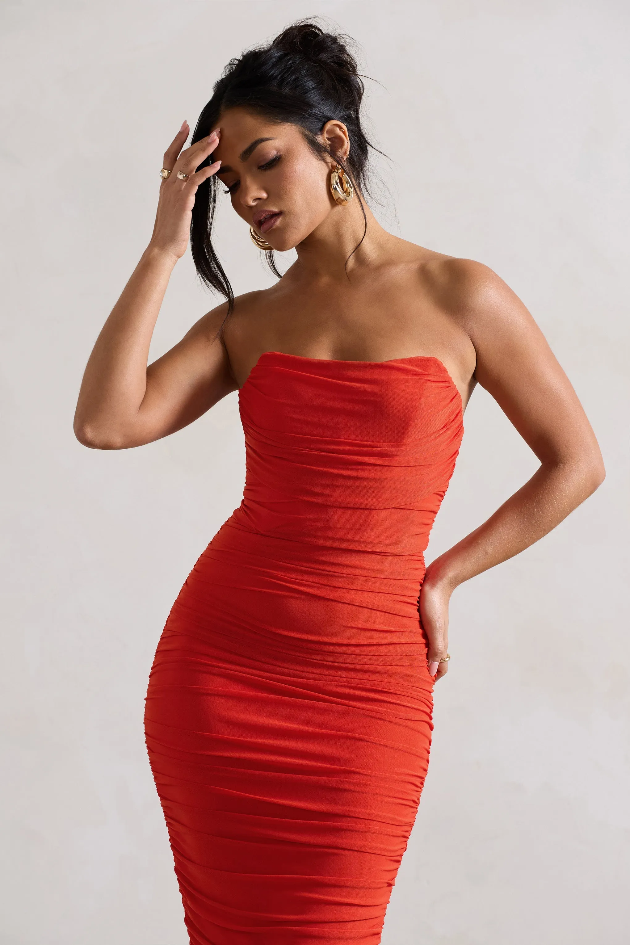 Nylah | Robe mi-longue moulante orange froncée et corset